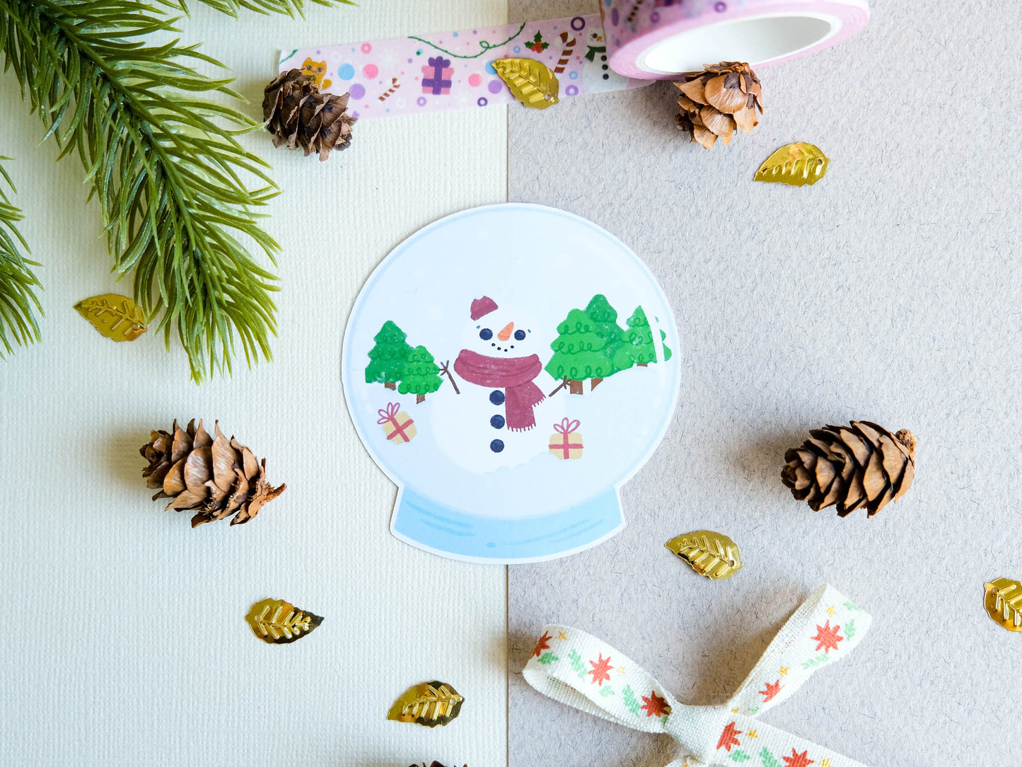 Sticker matte Cute Snowglobe with a Snowman and gifts perfect to decorate every surface to celebrate the Holidays