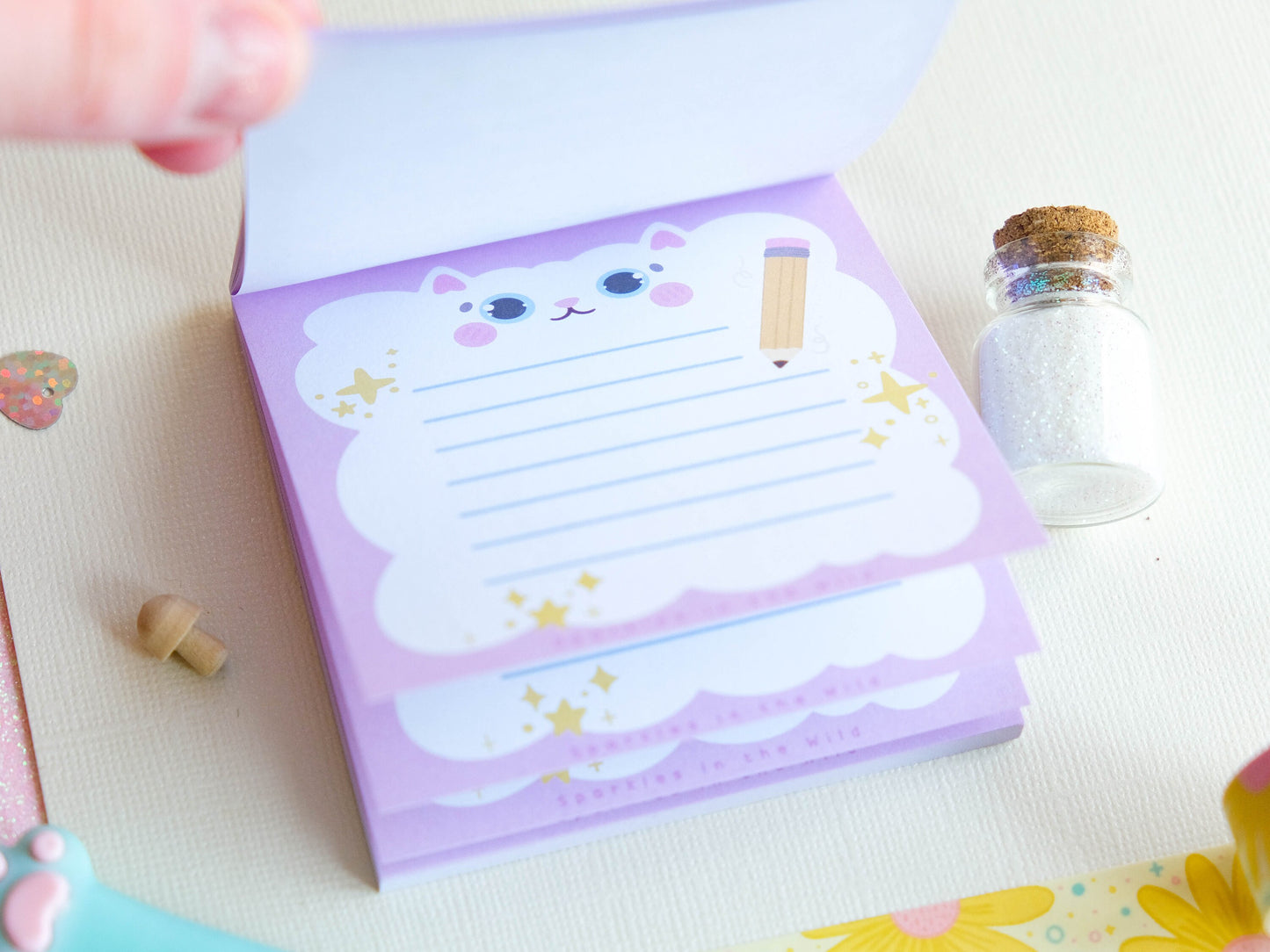 Square notepad with detachable sheets for book lovers, featuring a library and a cozy sleeping cat ambiance with 50 sheets for note-taking