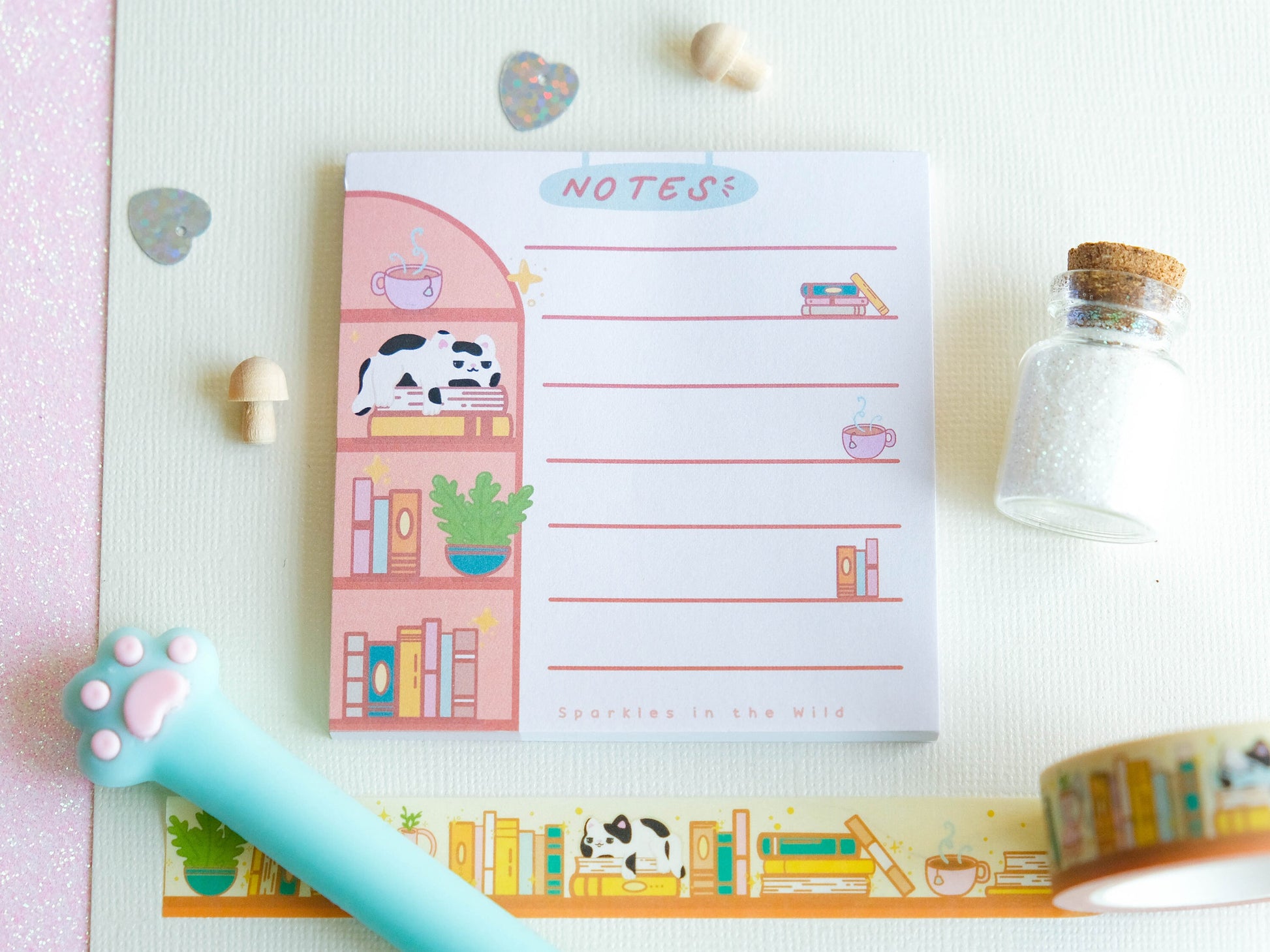 Square notepad with detachable sheets for book lovers, featuring a library and a cozy sleeping cat ambiance with 50 sheets for note-taking