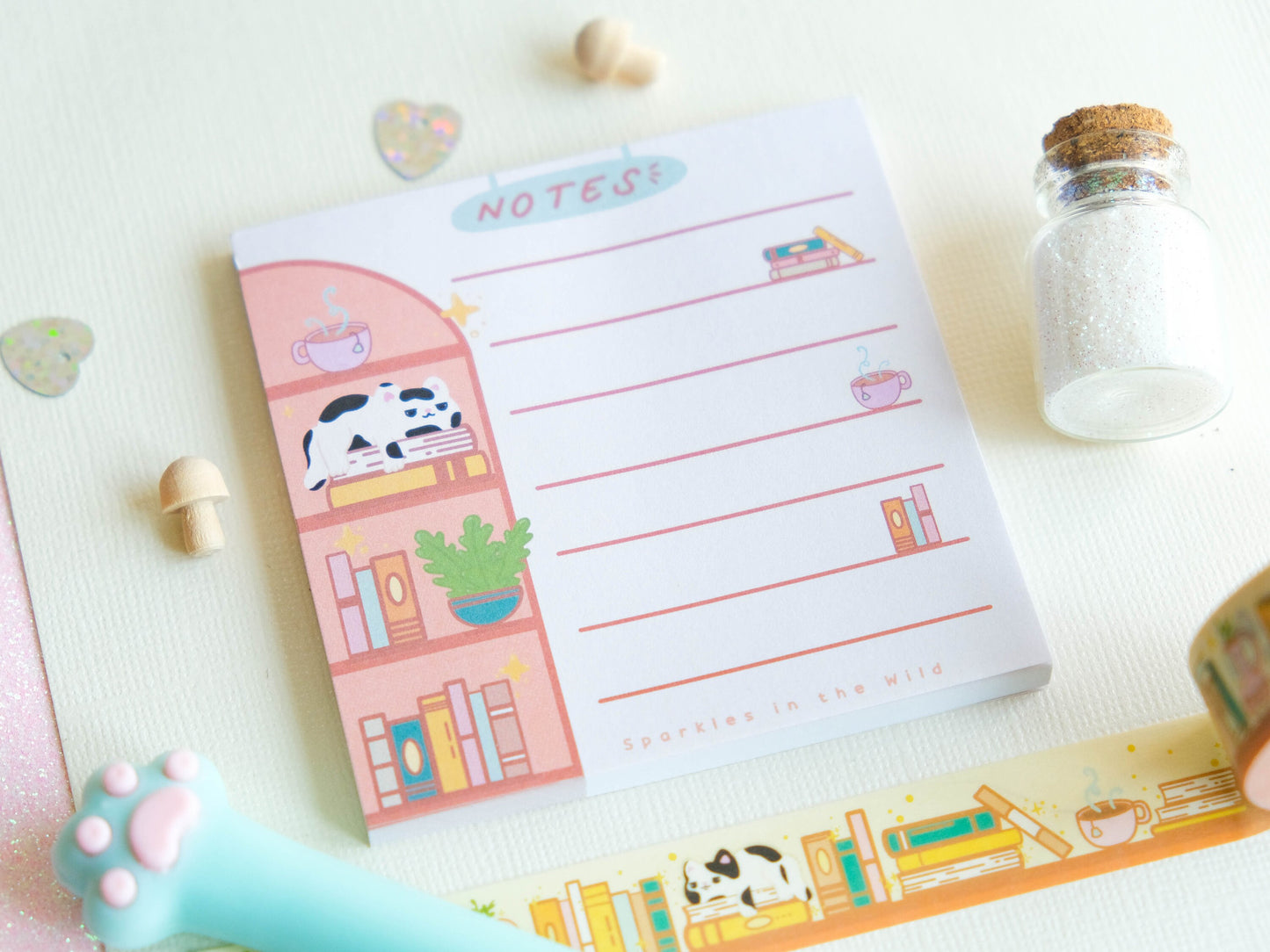 Square notepad with detachable sheets for book lovers, featuring a library and a cozy sleeping cat ambiance with 50 sheets for note-taking