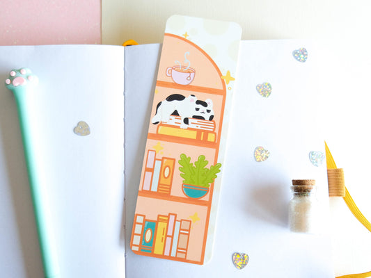 Library-themed black and white cat bookmark for book lovers